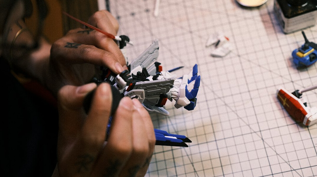 person building robot