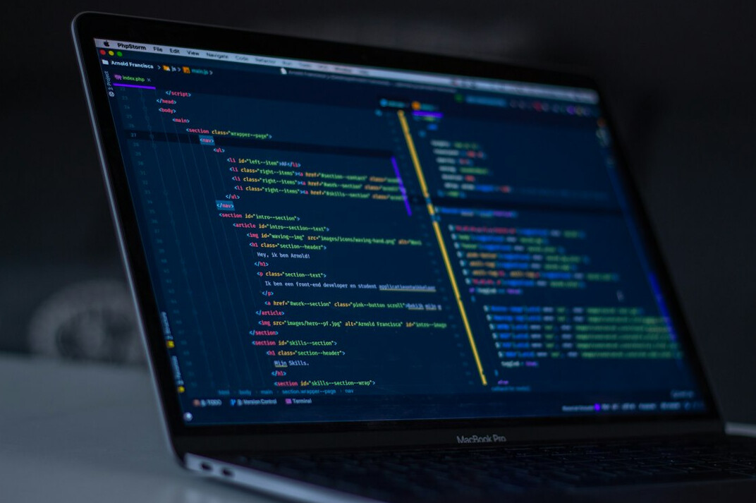 person learning programming on laptop